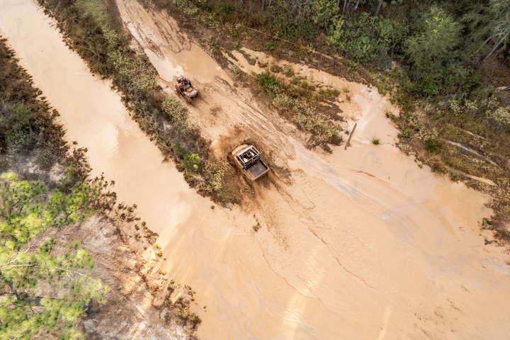 4-wheelers going through mud